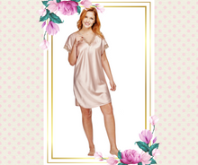 Slip into something Charming from Shadowline at Margaret Lawton Nightgowns. Shimmering sexy nightshirt in blush or dramatic black has a delicate lace trim that enhances the neckline and dolman sleeves. This sleek, sleepshirt fits comfortably over the bodice and feels oh-so-silky against your skin. 