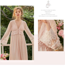 This elegant peignoir is the ultimate in feminine grace. The transparent robe features a gorgeous, embroidered bodice punctuated by three pearl buttons and a beautiful ruffle. The robe is a simple design of soft material, with spaghetti straps and deep v-neck trimmed with soft scalloped lace.