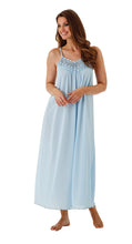 We just love this silky, chic nightgown from Shadowline-Velrose.  Slip into something a little more comfortable with this long and flowy woman’s nightgown. Hand braided spaghetti straps and a Venise lace appliqué neckline bring this elegant nightgown to life. Shadowline’s® Opacitrique® nylon is soft and enjoyable, making it a bedtime must-have!  Available in light blue and black.