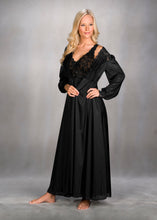 Made with shimmery, silky Satintrique® fabric made in the USA, this beautiful vintage-inspired peignoir from Velrose-Shadowline feels and looks amazing. Lightweight and airy skirt and sleeves, with a beautiful European stretch lace that delicately covers the bust, cuffs, and shoulders. Perfect bridal or trousseau gift. Fits true to US sizes. Best for cup size DD or smaller. Gorgeous and easy to wear. Available from Margaret Lawton in black, red, champagne and shimmery silver. 