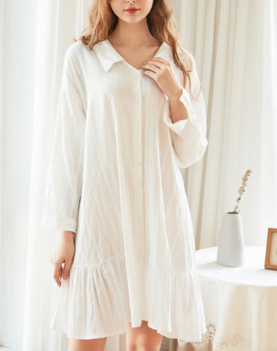 The is a beautiful semi-sheer, all cotton knee length nightgown with long sleeves. There is a flirty six inch ruffle on the hem on the right and left sides. This Margaret Lawton Nightgown is both pretty an sophisticated.