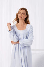 Pretty woman in a light blue ankle length Eileen West flannel nightgown. Roomy and oh-so-comfortable, made of 100% cotton flannel with beautiful details.  This pretty nightgown is available in XS to a XL and runs large.