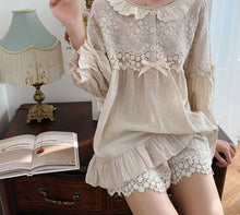stantly transform your mood with these beautiful 100% crisp cotton pajamas with embroidery and a perfect balance of ruffles on the top and bottoms. Plenty of legroom gives the shorts look almost like a pretty skirt. Beautiful crisp white cotton or linen-colored linen will keep you cool and comfortable.