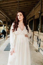 Beautiful, confident woman in champaign colored Shadowline Peignoir from Margaret Lawton Nightgowns. Lacey and gorgeous. Available from Margaret Lawton in black, red, champagne and shimmery silver.