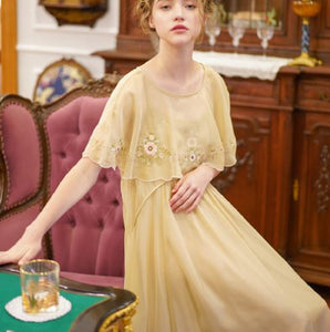 Gorgeous layers of organza for this beautiful nightgown trimmed in victorian embroidery. Spaghetti straps and loose fitting nightgown from Margaret Lawton Nightgowns. Lovely short, transparent shawl comes with the nightgown.