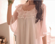 Close up image of gentle chiffon ruffles, trimmed in satin, of the neckline  of dreamy sheer nightgown from Margaret Lawton.  