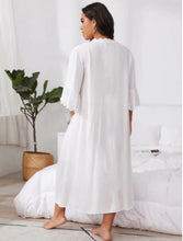 Back view of nightgown that's soft and feminine. This pretty, lightweight nightgown is easy to wear and looks beautiful on everybody. Featuring a deep V-neck trimmed in soft lace, and beautiful three-quarter lacey flounce sleeves that provide upper arm coverage. A slanted empire waist provides a flattering look. Princess-length and plenty of moving room this lovely nightgown an all-time favorite. 