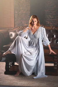 Made with shimmery, silky Satintrique® fabric made in the USA, this beautiful vintage-inspired peignoir from Velrose-Shadowline feels and looks amazing. Lightweight and airy skirt and sleeves, with a beautiful European stretch lace that delicately covers the bust, cuffs, and shoulders. Perfect bridal or trousseau gift. Fits true to US sizes. Best for cup size DD or smaller. Gorgeous and easy to wear. Available from Margaret Lawton in black, red, champagne and shimmery silver.