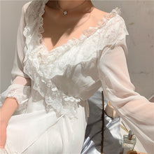 Detail of Margaret Lawton's Drop Dead Gorgeous Peignoir. Shows ruffled trim on the neckline of the robe that criss-crosses to create a stunning V-neckline.    egant, sexy and glamorous. 