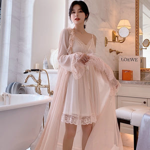 Full view of Margaret Lawton's Dead Gorgeous Peignoir, showing a flowing open robe and a pretty knee length nightgown with a lace hem and lace v-neckline. Beautiful lace trimmed nightgown with long ruffle trimmed chiffon robe.