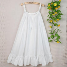 This darling, short, sleeveless nightgown from Margaret Lawton is made with all-cotton fabric that has a delightful feel. The straps and round neckline are trimmed with sweet white flower embroidery which also trims the the ruffled hem. It's so flirty and sweet you'll love wearing it.