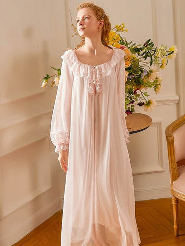 Image of a woman wearing a pink Classic Nightgown from Margaret Lawton Nightgowns.